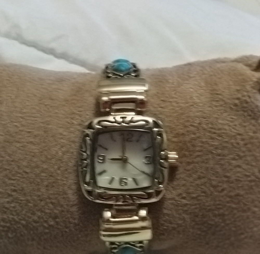 Pavana Goldtone Cuff Watch.